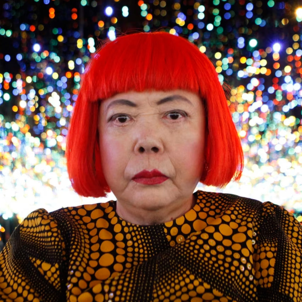 Portrait of artist Yayoi Kusama wearing her signature polka dots in infinity room