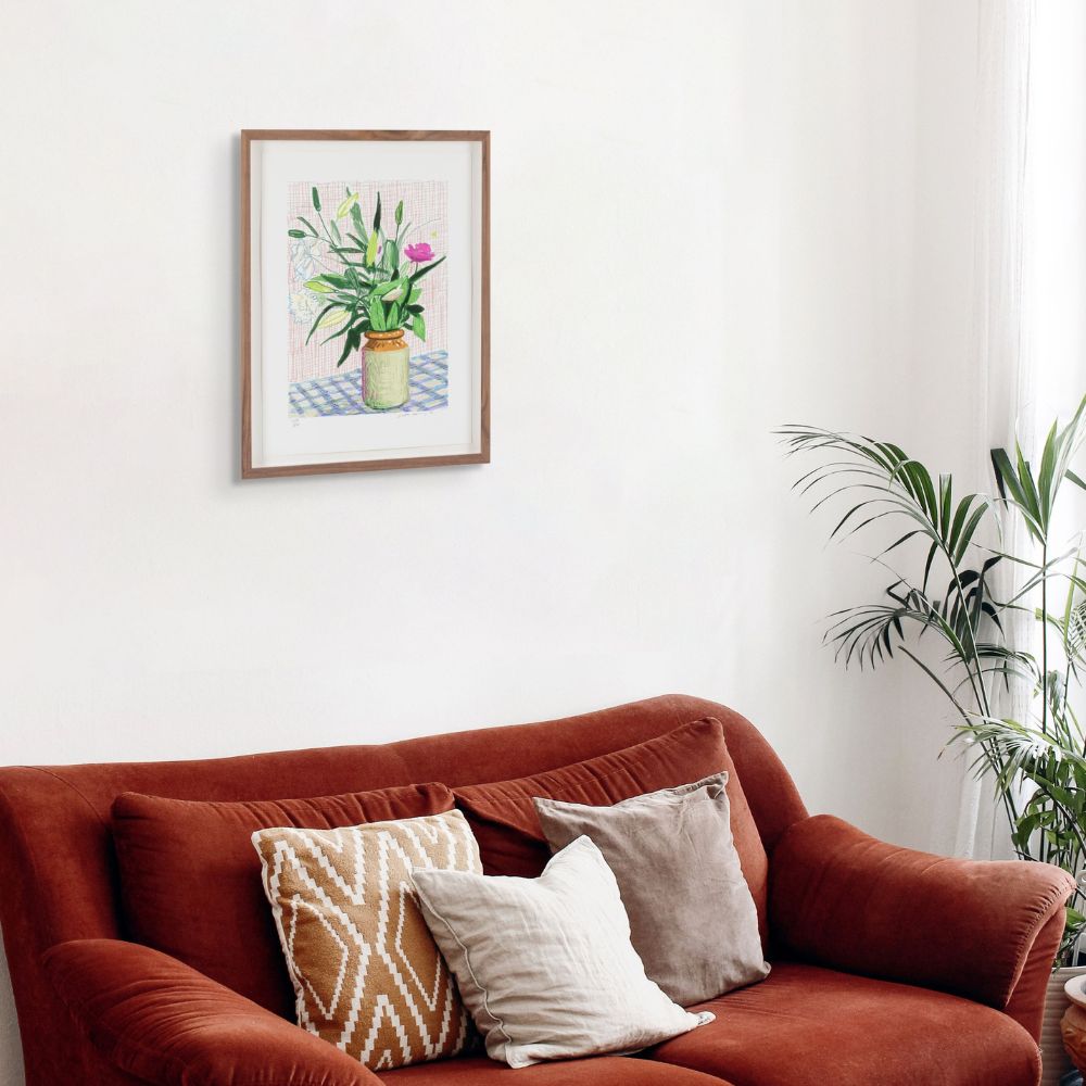 David Hockney Floral print framed on wall in bright minimal living room setting