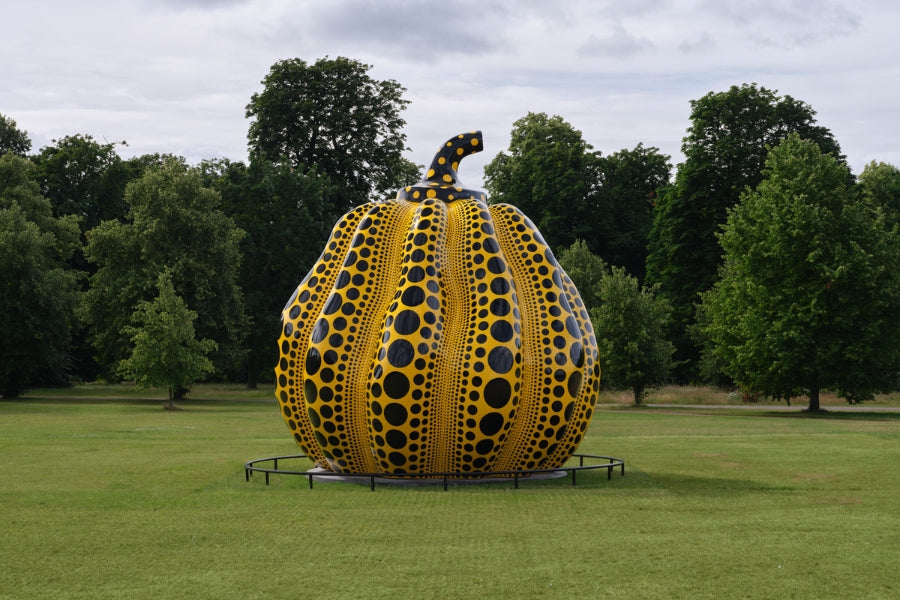 Yayoi Kusama yellow pumpkin sculpture covered in black polka dots