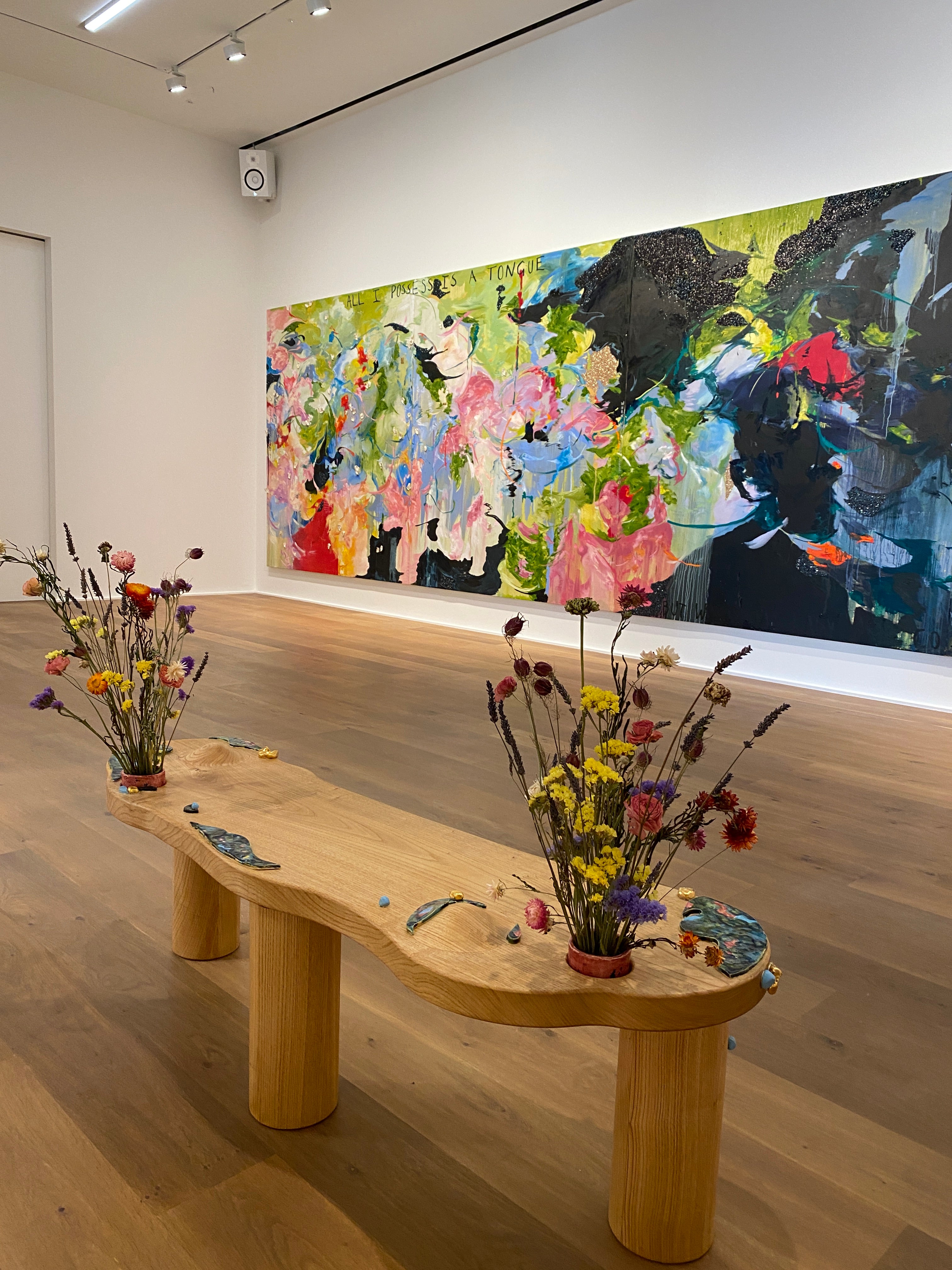 Floral installation and seating area by Michaela Yearwood-Dan