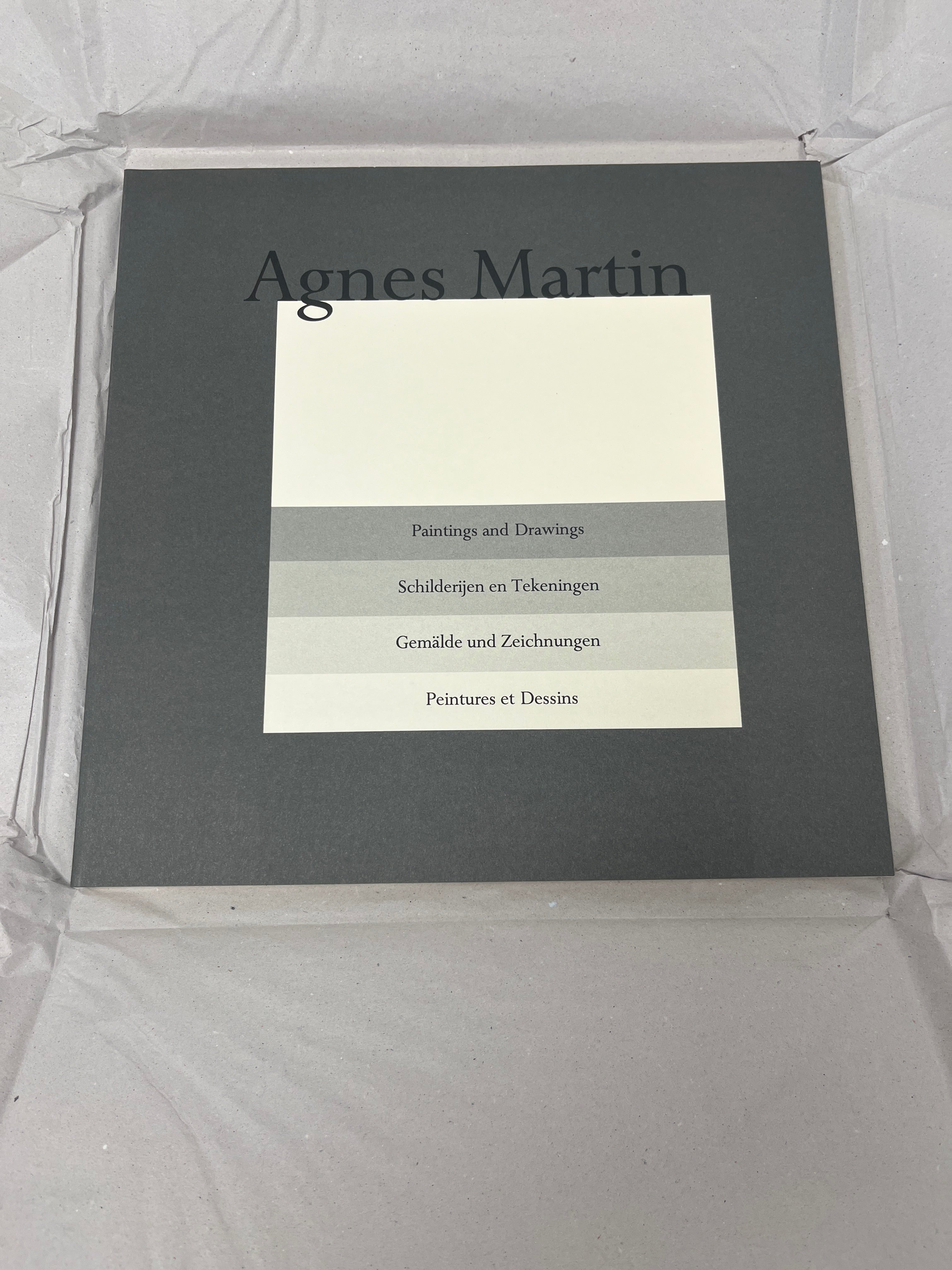 Limited edition Agnes Martin print from "Paintings and Drawings 1974-1990" series, showcasing minimalist geometric patterns.