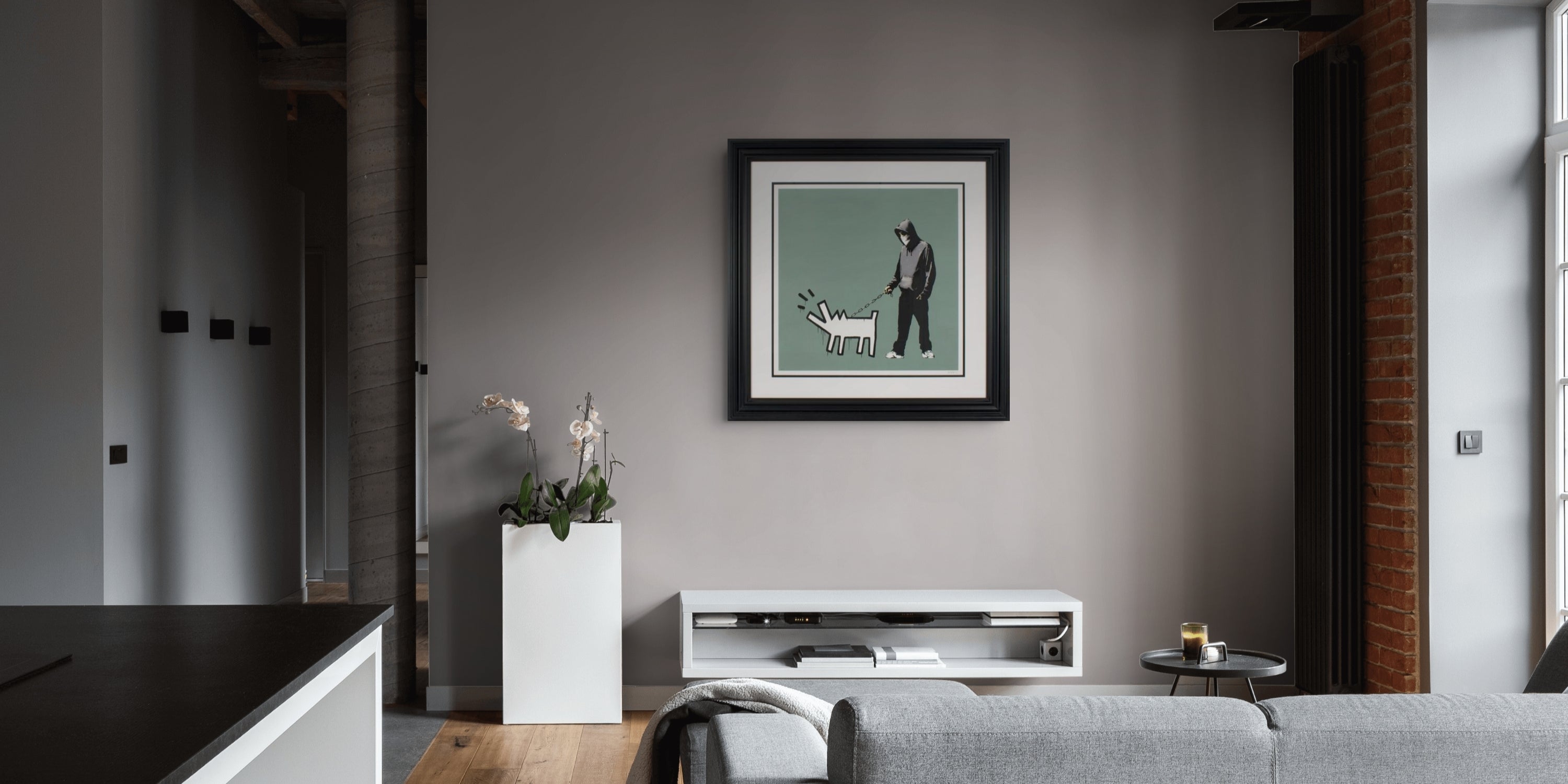 Banksy Choose Your Weapon Slate print displayed in a contemporary interior