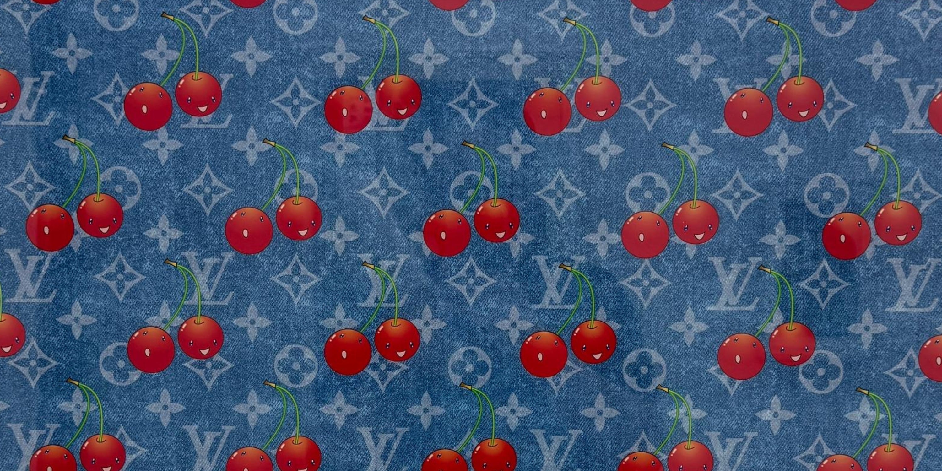 Close-up of Takashi Murakami LV Cherry Blue Denim showing vibrant silkscreen colour, Cherry motif and Louis Vuitton Denim Monogram detail.