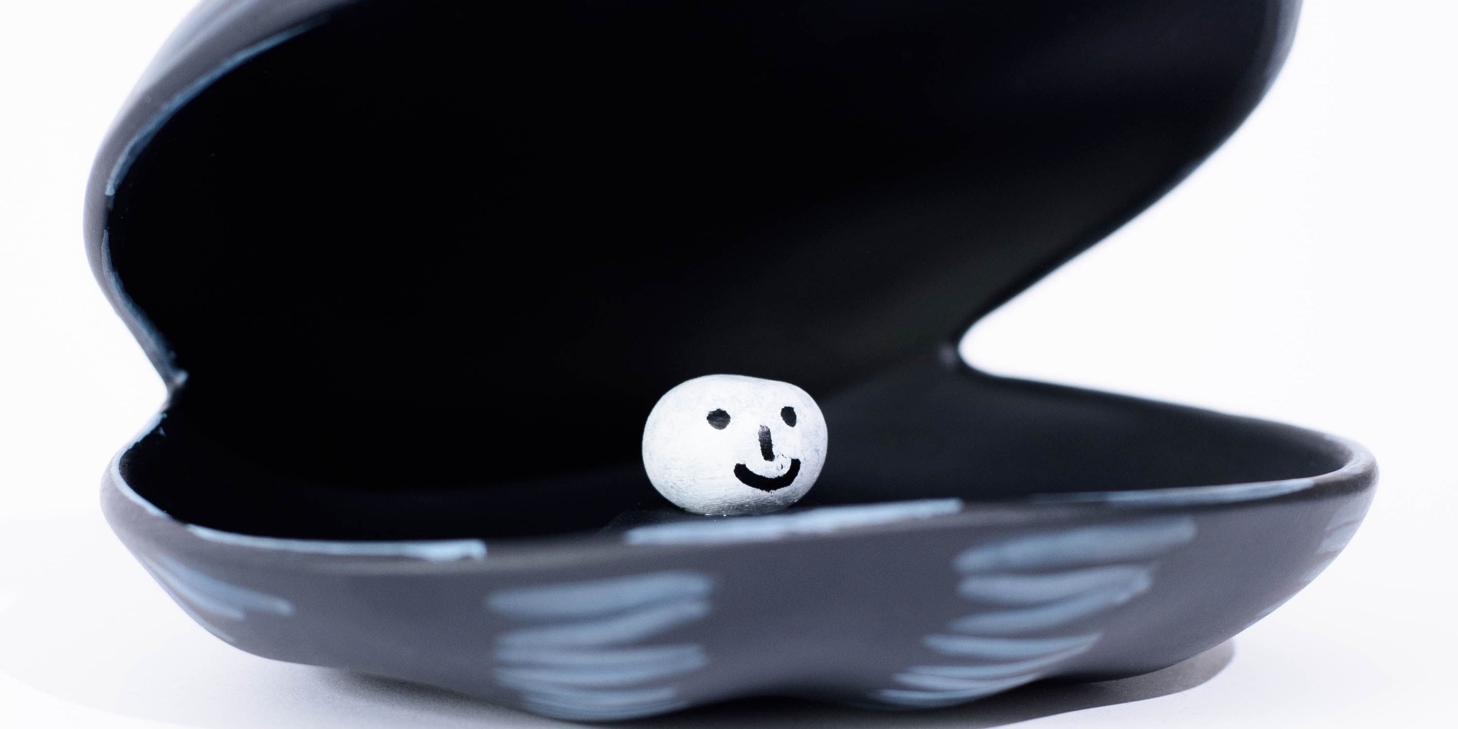Close-up of David Shrigley editioned sculpture showing expressive linework and character