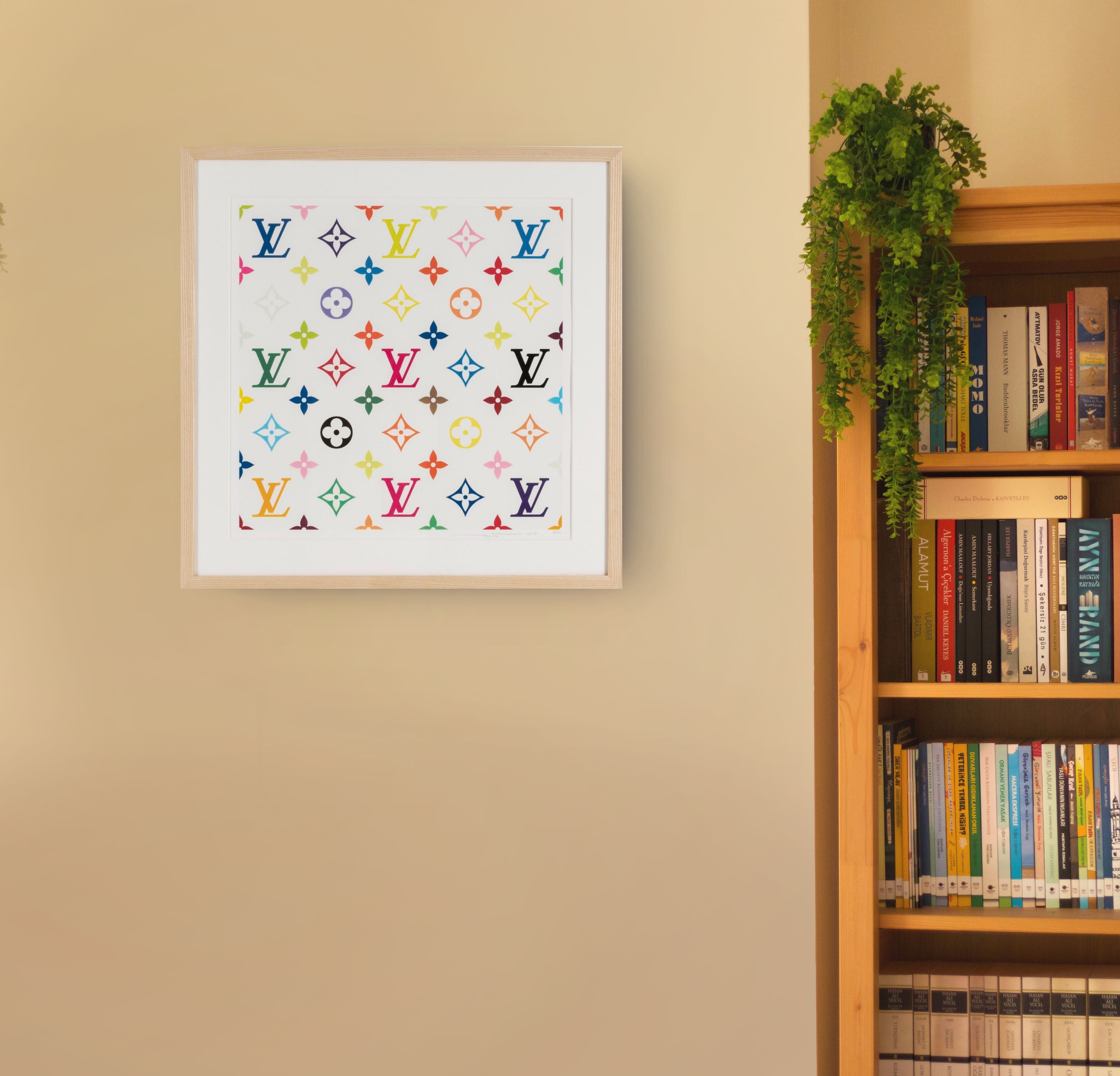 Takashi Murakami Louis Vuitton Multicolour Monogram print showing vibrant coloured motifs on a white background in a modern contemporary interior setting