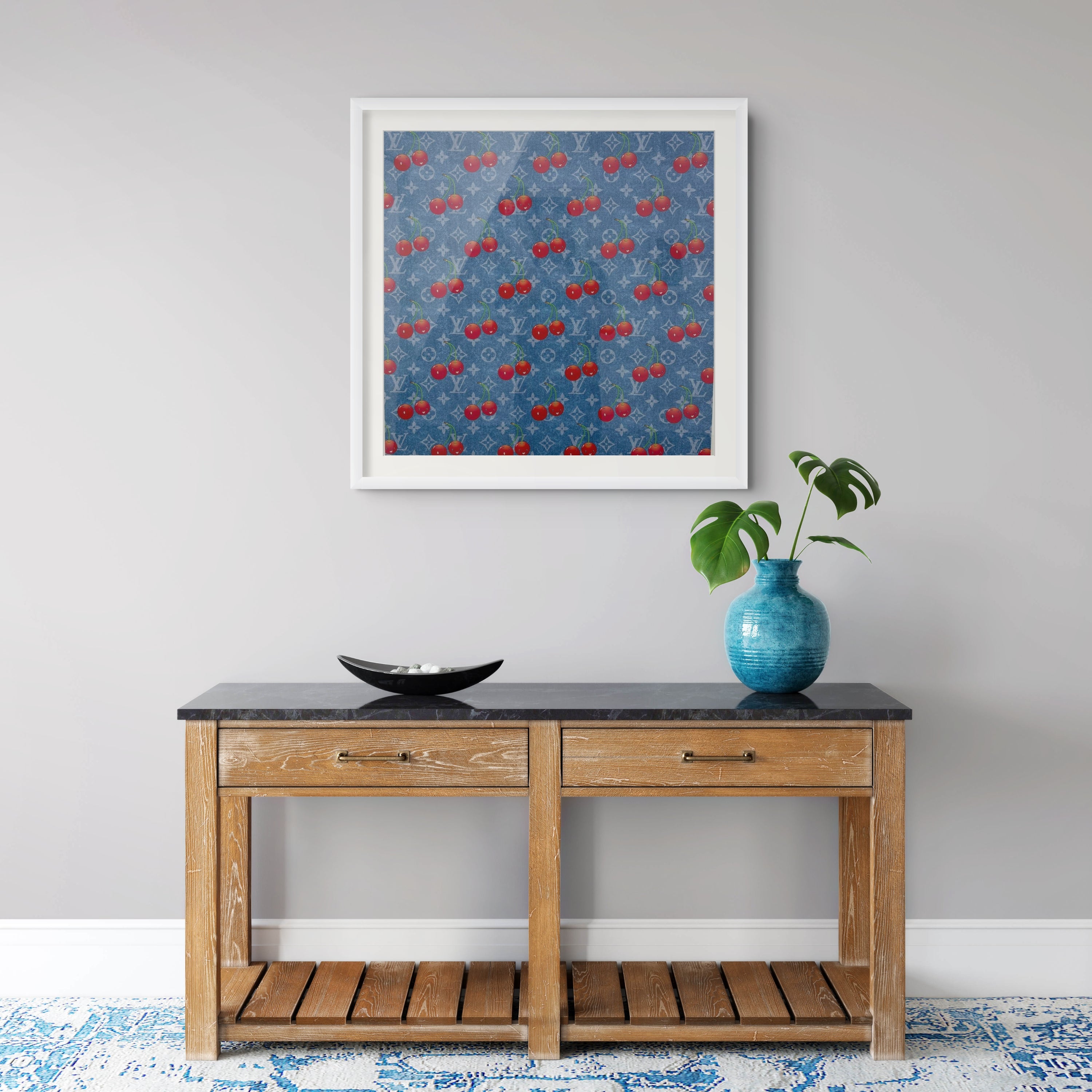 Takashi Murakami contemporary print with blue Louis Vuitton Monogram pattern and smiling Cherry characters from the Louis Vuitton series.n a modern contemporary interior setting
