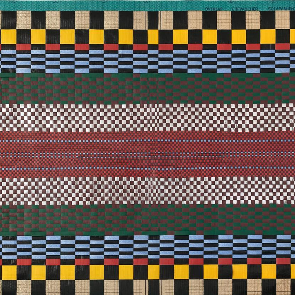 Caroline Monnet, Piece the Ground Back Together, 2026. Floor and roof underlayment, waterproofing and insulating membranes, tarpaulin, thread, 47 x 67 (Framed). Photo: Chantier Monnet. Courtesy of the Artist and Blouin Division