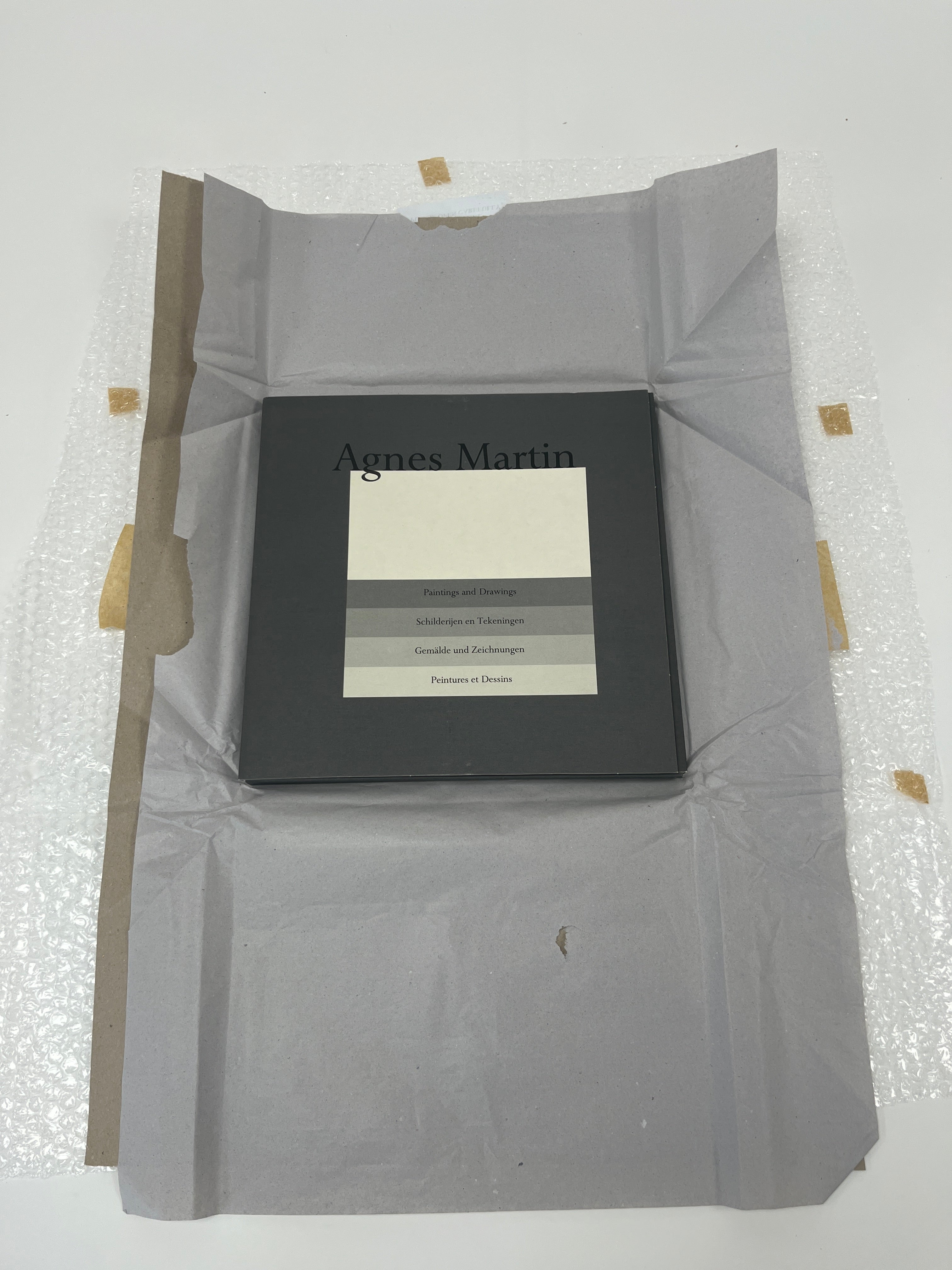 Limited edition Agnes Martin print from "Paintings and Drawings 1974-1990," by Lougher Contemporary, featuring minimalist abstract artwork.