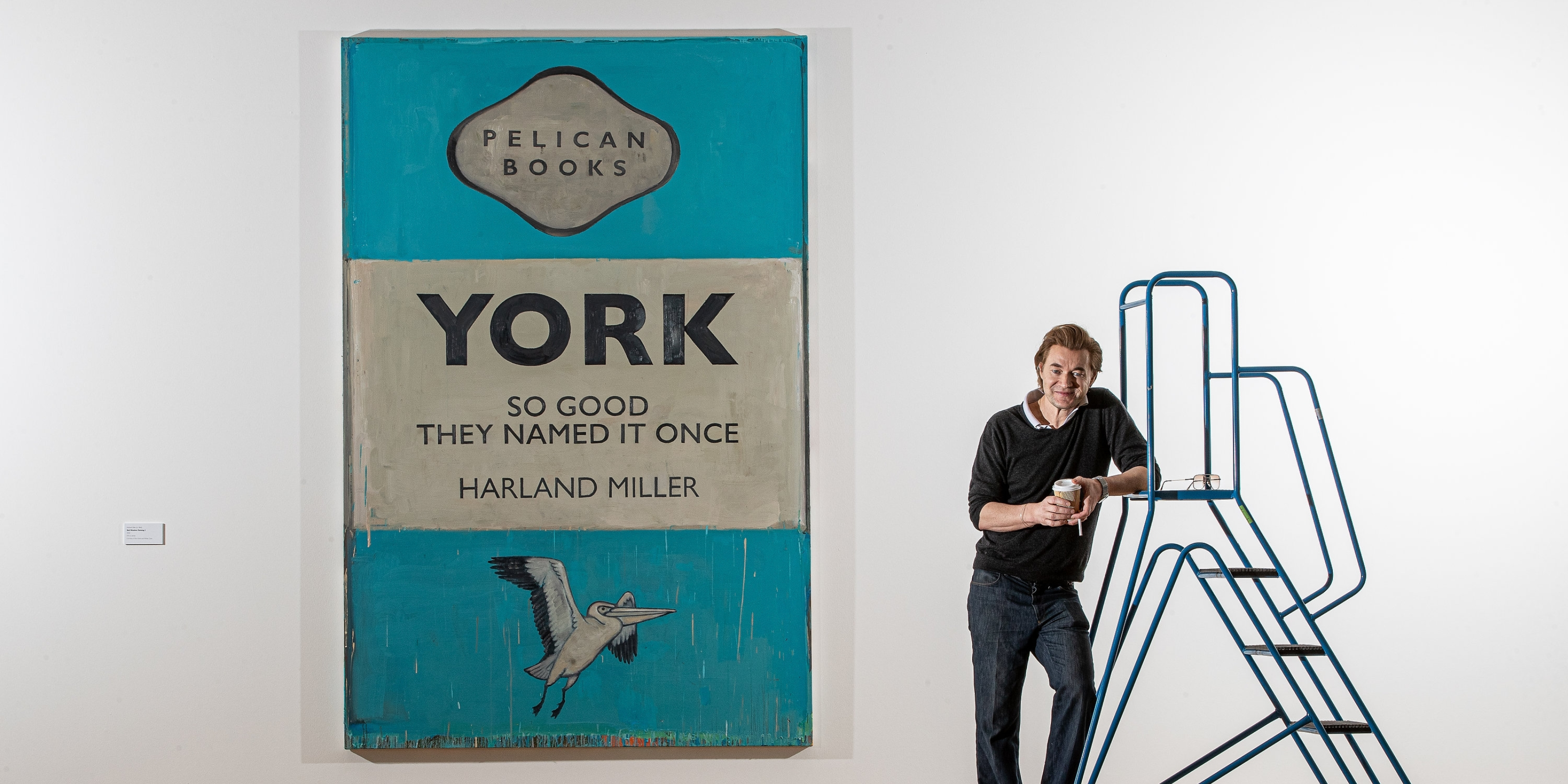 Harland Miller Standing in front of penguin book cover art
