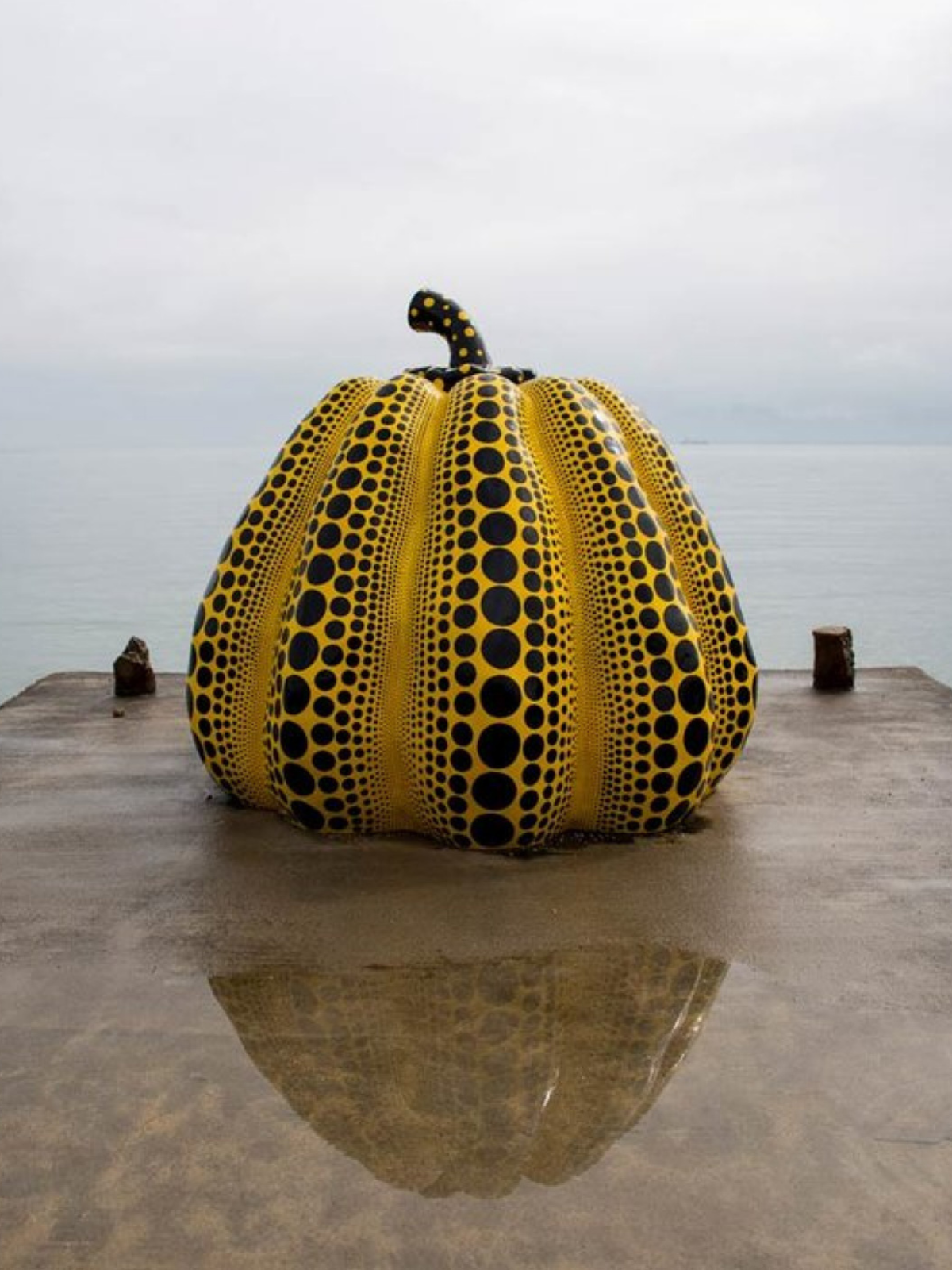 Yayoi Kusama Pumpkin Sculpture on the sea