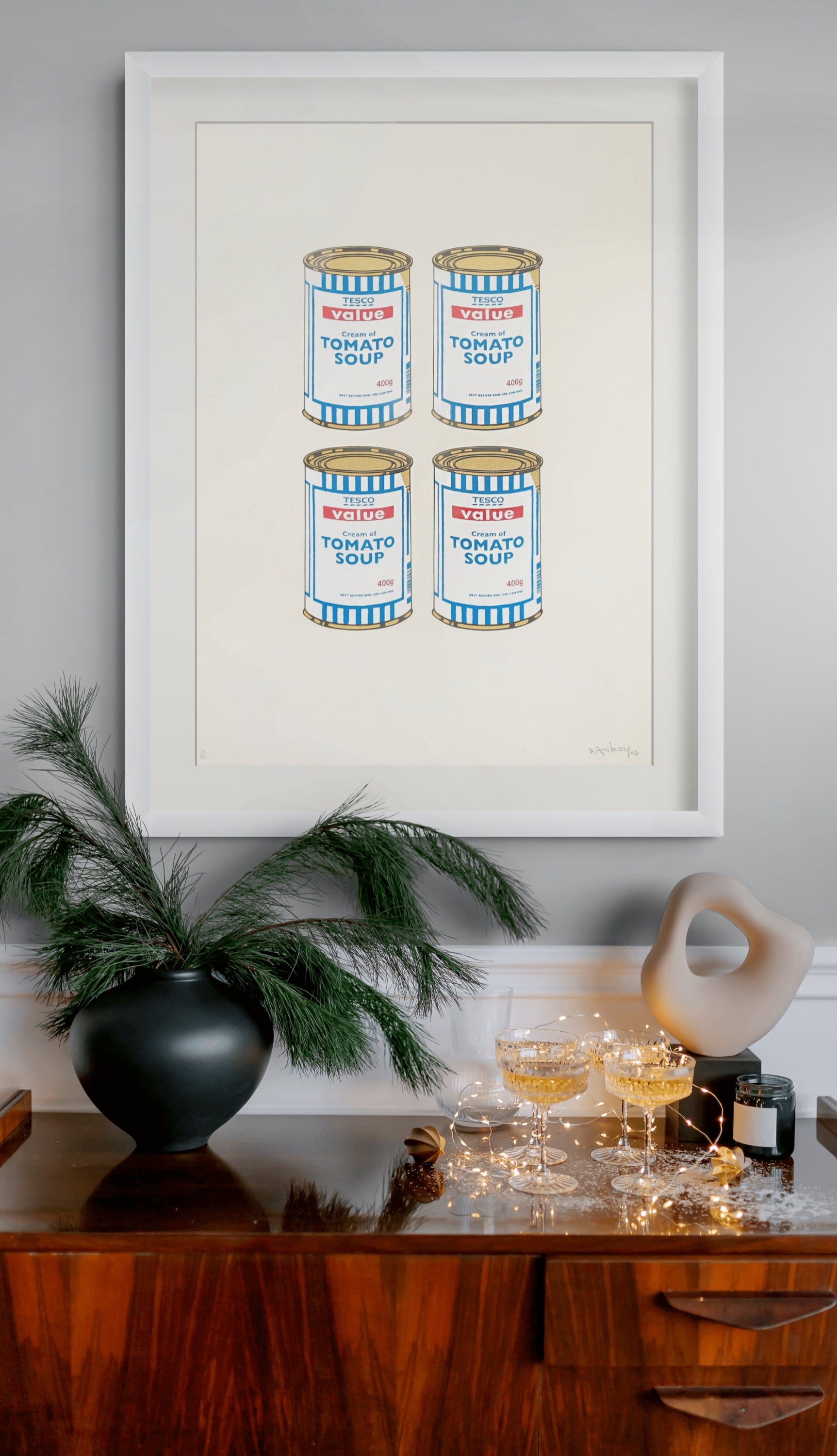 Banksy Four Soup Cans print displayed in a contemporary interior