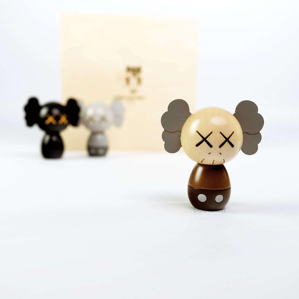 KAWS, Holiday Japan Limited Kokeshi Doll Set (Set of 3), 2019 For Sale - Lougher Contemporary
